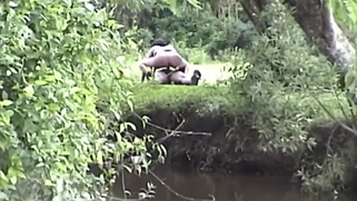Desi couple from the countryside is caught having sex in riverbank