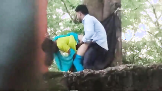 A desi couple having sex in a public park was caught on camera by a voyeuristic masturbator