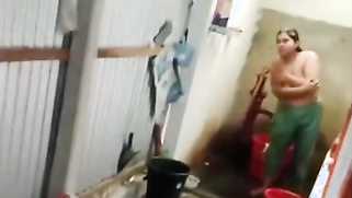 A perv nephew secretly recorded his village aunty naked bathing and nearly got caught