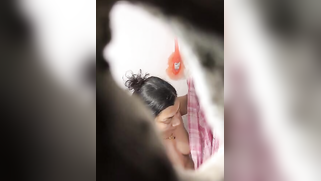 Nephew hides behind the hole in the wall to watch and masturbate while his aunt bathes nude