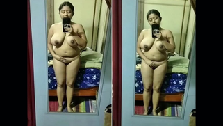 Busty Rural Aunty , Undressing  Nude Seductively Before Mirror for Horny Urban Boyfriend in Hot MMS Clip
