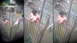 Indian Bhabhi’s Fat Tits Bouncing While She Washes Her Naked Body in the River