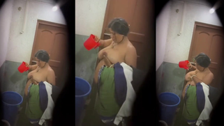 Desi Aunty Jiggling Her Massive Tits While Drenching Them Outdoors as Son Stealthily Filming on Cam