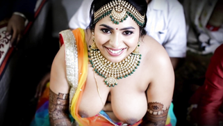Desi bride pops out fat fuckin' jugs for horny guests, cuck groom boils watchin' her slutty show | XXX Video on AllSex.XXX