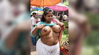 Desi Market Aunty Releases Massive Tits In Bustling Vegetable Market | XXX Video on AllSex.XXX