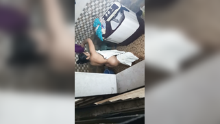 Hidden Cam Catches Slutty Desi Aunty Next Door Soaping Up Her Big Fat Tits in Shower