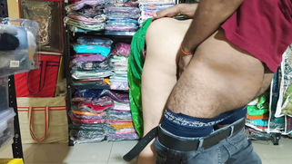 Desi shopkeeper pounds bhabhi's pussy for a new sari while hubby waits clueless back home