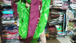 Desi shopkeeper pounds bhabhi's pussy for a new sari while hubby waits clueless back home