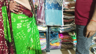 Desi shopkeeper pounds bhabhi's pussy for a new sari while hubby waits clueless back home