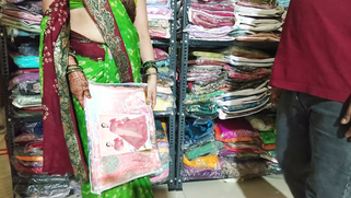 Desi shopkeeper pounds bhabhi's pussy for a new sari while hubby waits clueless back home