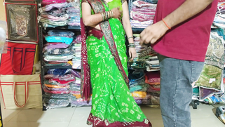 Desi shopkeeper pounds bhabhi's pussy for a new sari while hubby waits clueless back home