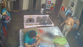 Leaked spy cam catches busty Desi bhabhi changing in bedroom showing huge tanker tits